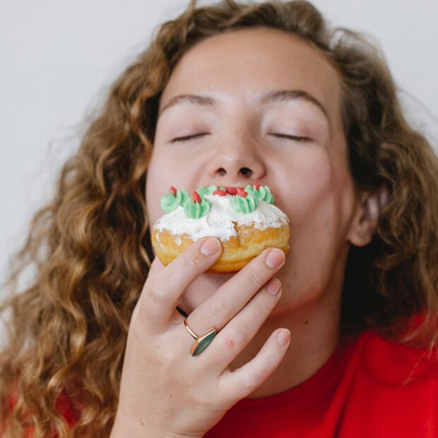 Woman enjoy donut