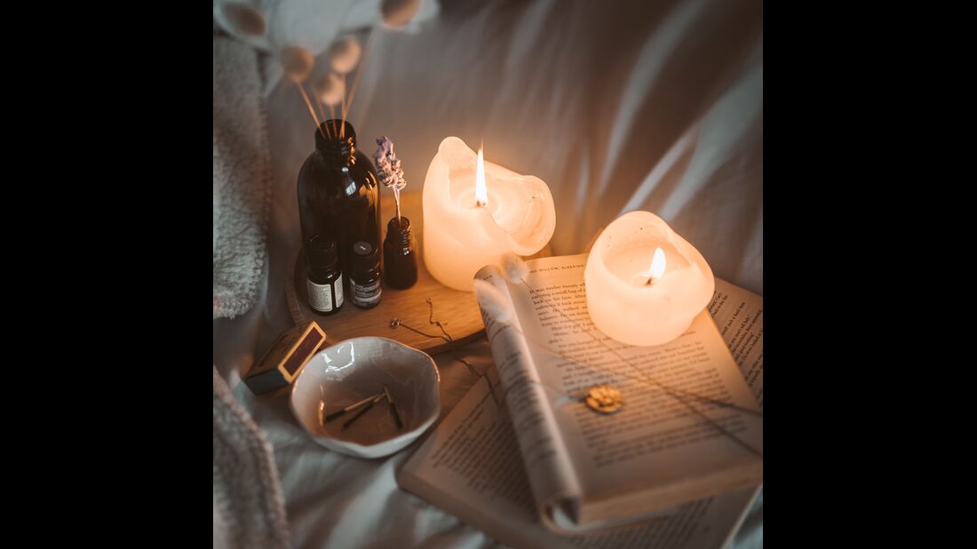 Kerzenschein im Bett