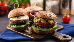 Vege,Burgers,With,Carrots,,Beetroots,And,Mushrooms.,Front,View.,Black