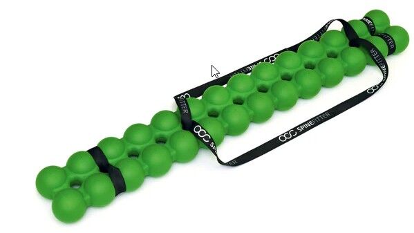 grünes Trainingsgerät mit zweireihig verbundenen Bällen für die Wirbelsäule